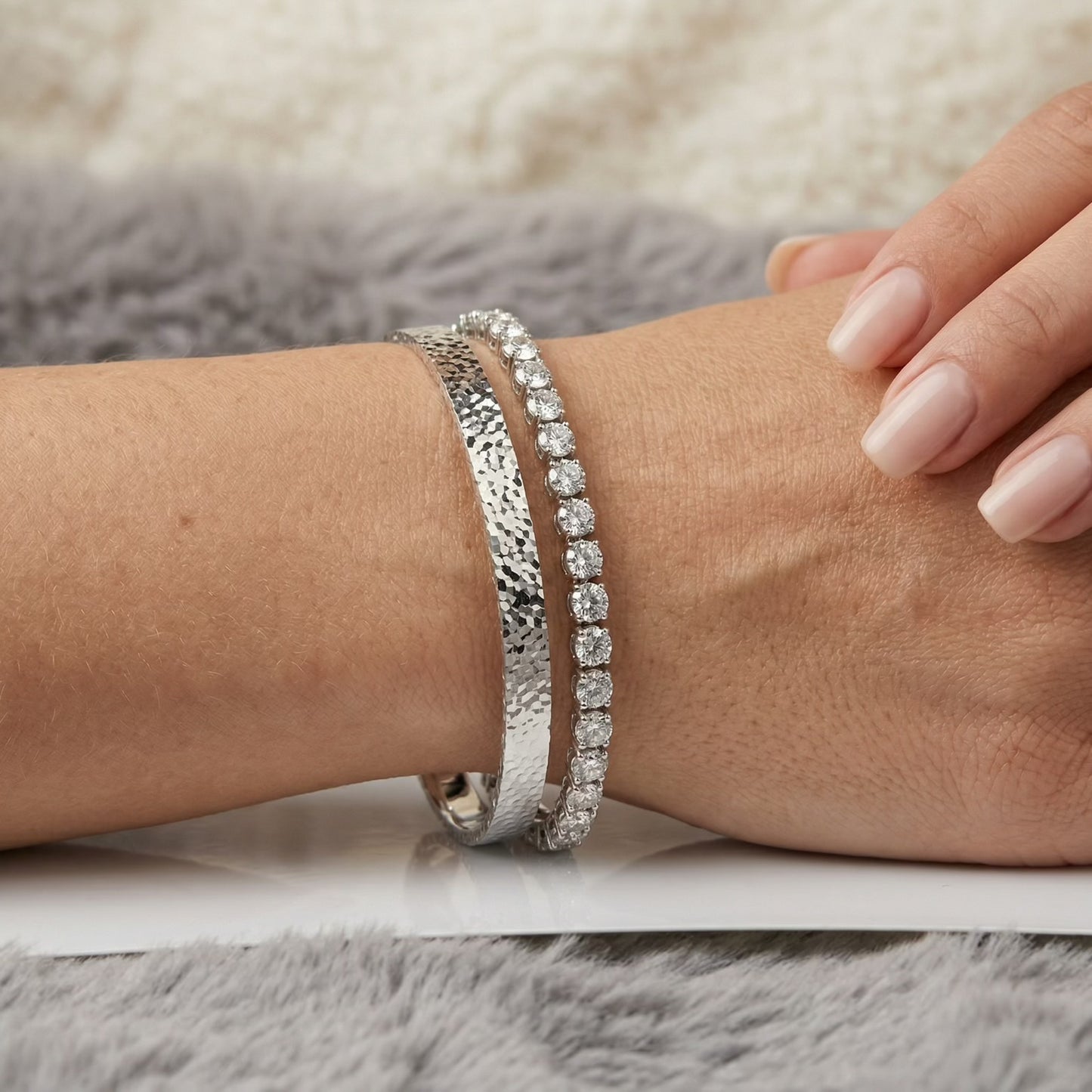 Mermaid Scale 925 sterling silver bangle worn on wrist, elegant lifestyle shot showcasing unique scale design.