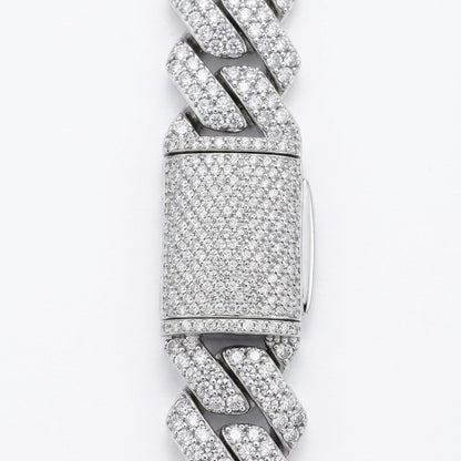 Silver bracelet clasp with moissanite accents on a white background