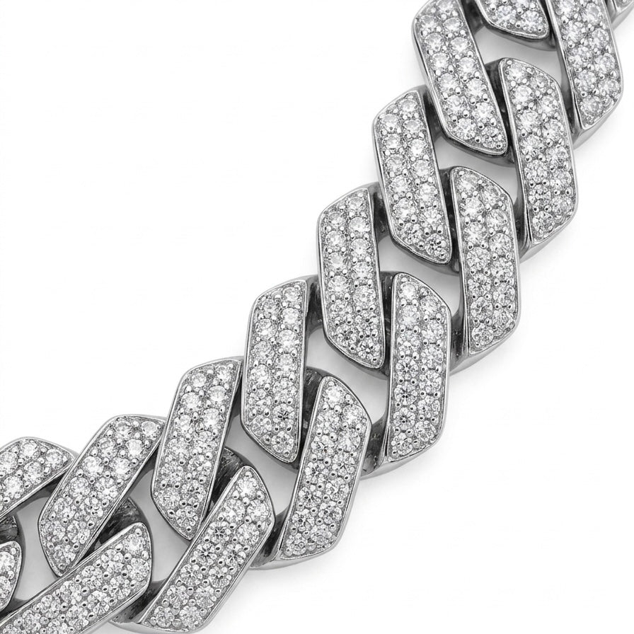 Silver chain bracelet with moissanite stones on a white background