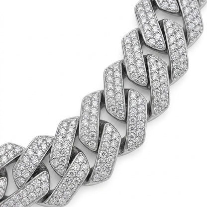 Silver chain bracelet with moissanite stones on a white background
