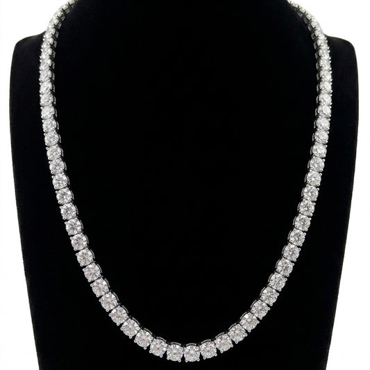 Tennis silver moissanite necklace on a black stand with a white background