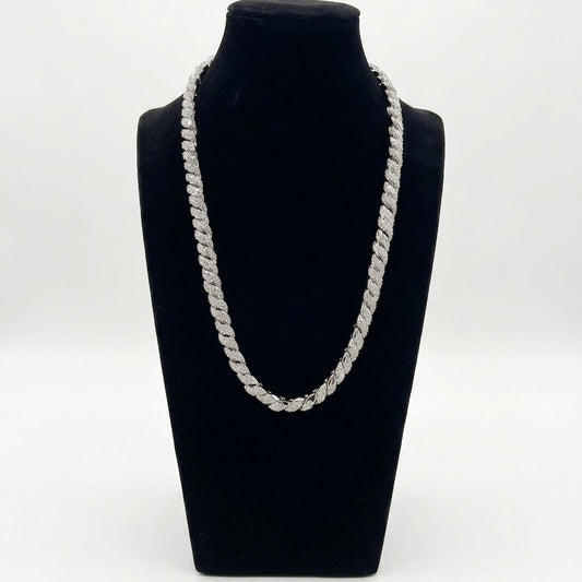 Silver moissanite chain necklace on a black mannequin bust against a white background