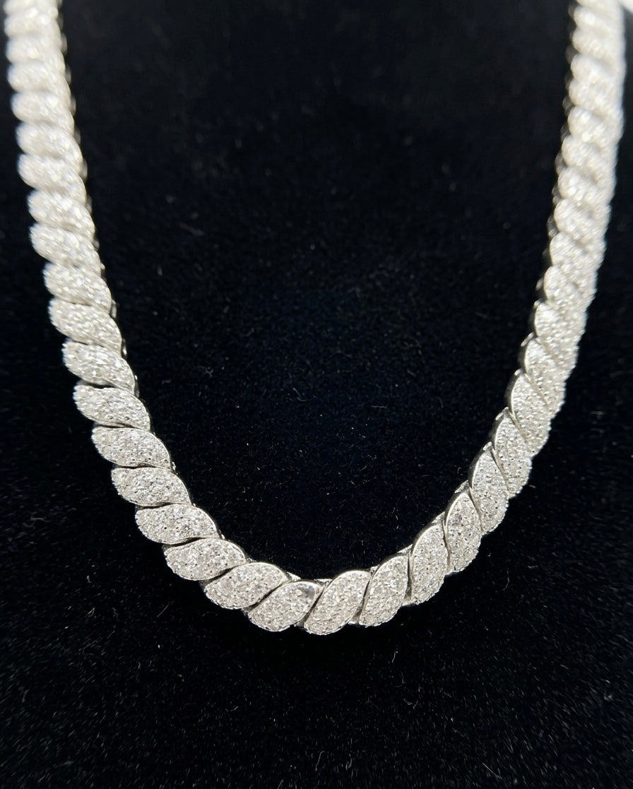 Silver rope chain moissanite necklace on a black background