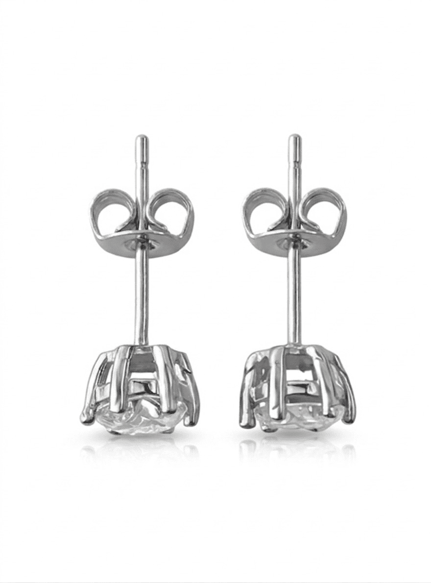 Pair of silver moissanite stud earrings with clear gemstones on a white background