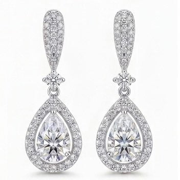 A pair of Duchess pear moissanite drop earrings, 1ct main stone 3.6ctw total, in 925 sterling silver.