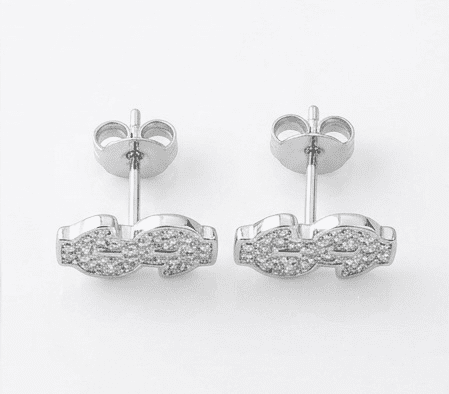 Pair of moissanite silver earrings on a white background