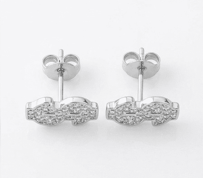 Pair of moissanite silver earrings on a white background