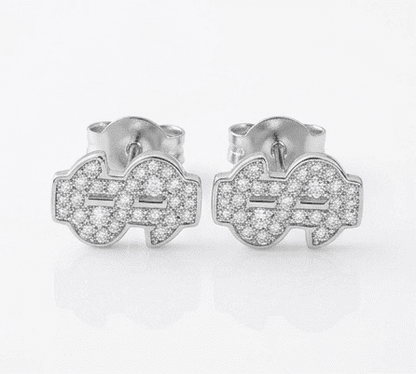 Pair of silver earrings with dollar shape moissanite accents on a white background