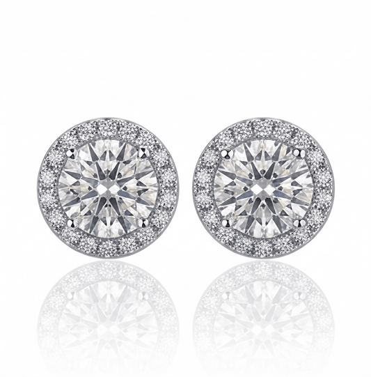 A pair of halo moissanite stud earrings, 1ct main stone 2.6ctw total, in 925 sterling silver.