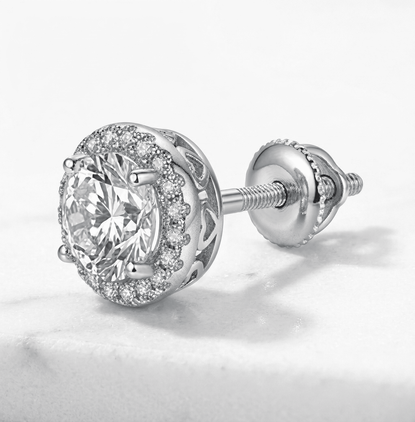 45-degree view of halo moissanite stud earrings showing brilliant stone depth in sterling silver.