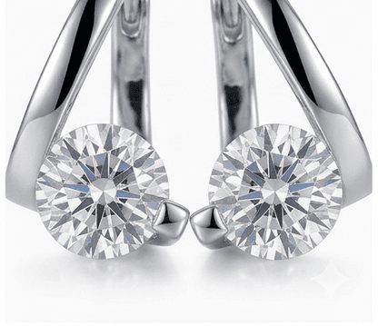 Front view of Elysian moissanite earrings, 2ctw hand set in 925 sterling silver on white background.