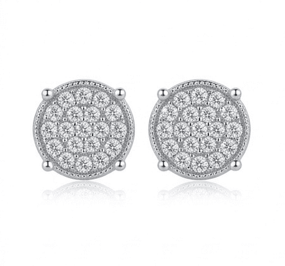 A pair of Maverick moissanite stud earrings in 925 sterling silver on white background.