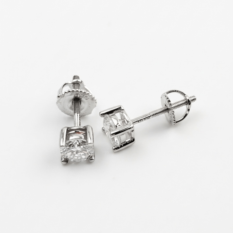 Pair of moissanite stud earrings on a white background