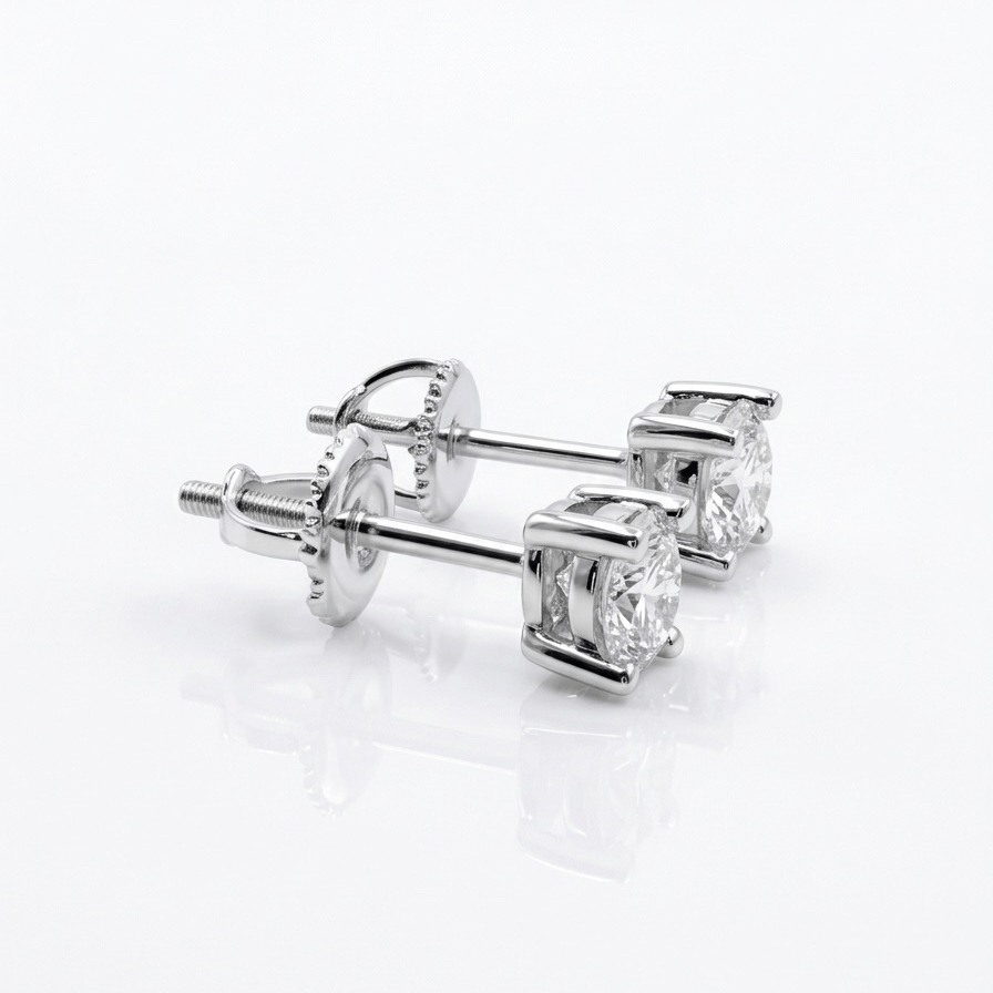 Pair of moissanite stud earrings on a white background