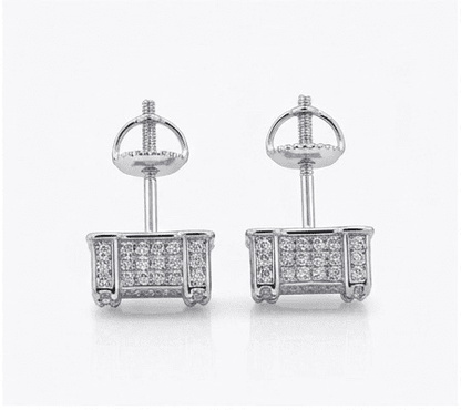 Pair of diamond stud earrings on a white background