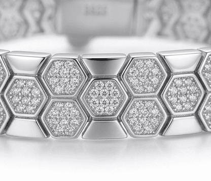 Close-up of Bee Yourself moissanite bracelet showcasing intricate 800+ hand set stone bee design in sterling silver.