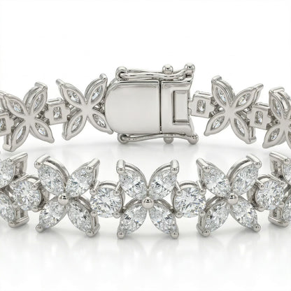 Close-up of Luminary moissanite bracelet showcasing brilliant butterfly design with 8.5ctw hand set stones in sterling silver.