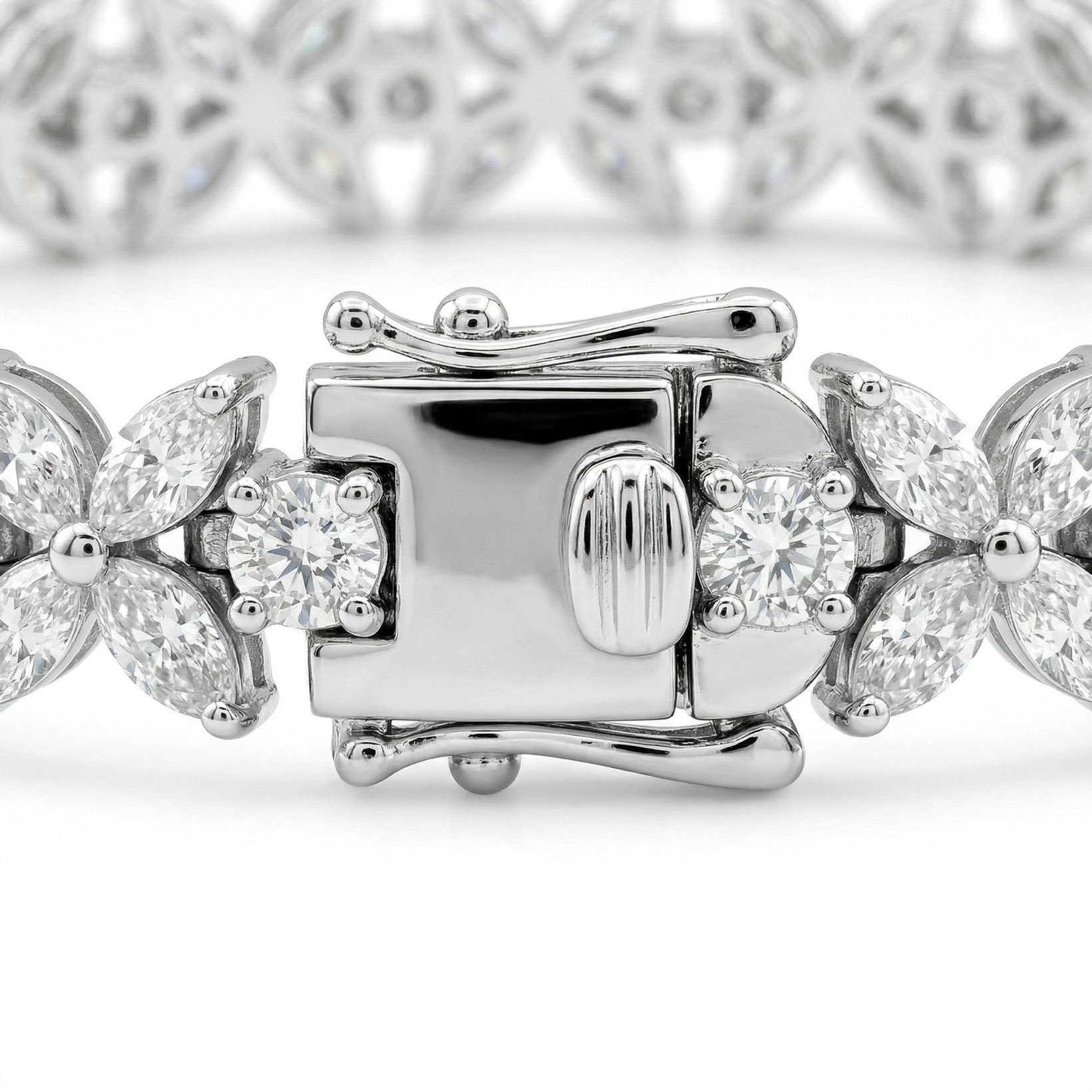 Close-up of Luminary moissanite bracelet clasp closed, secure setting in 925 sterling silver butterfly design.