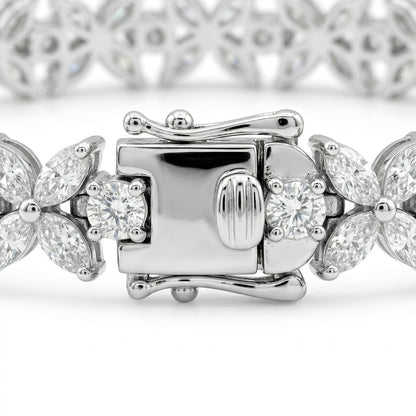 Close-up of Luminary moissanite bracelet clasp closed, secure setting in 925 sterling silver butterfly design.