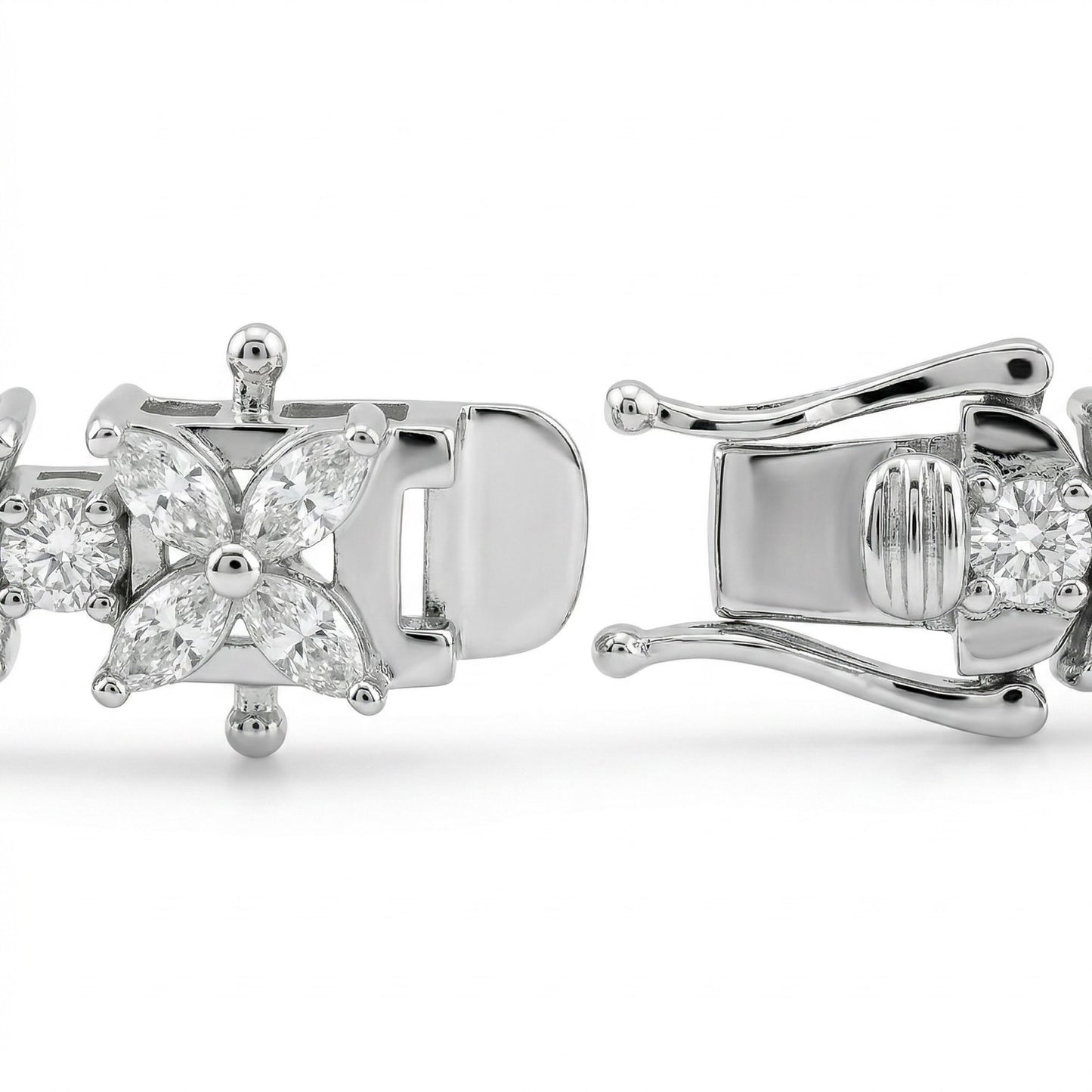 Close-up of Luminary moissanite bracelet clasp open, revealing secure mechanism in 925 sterling silver butterfly design.