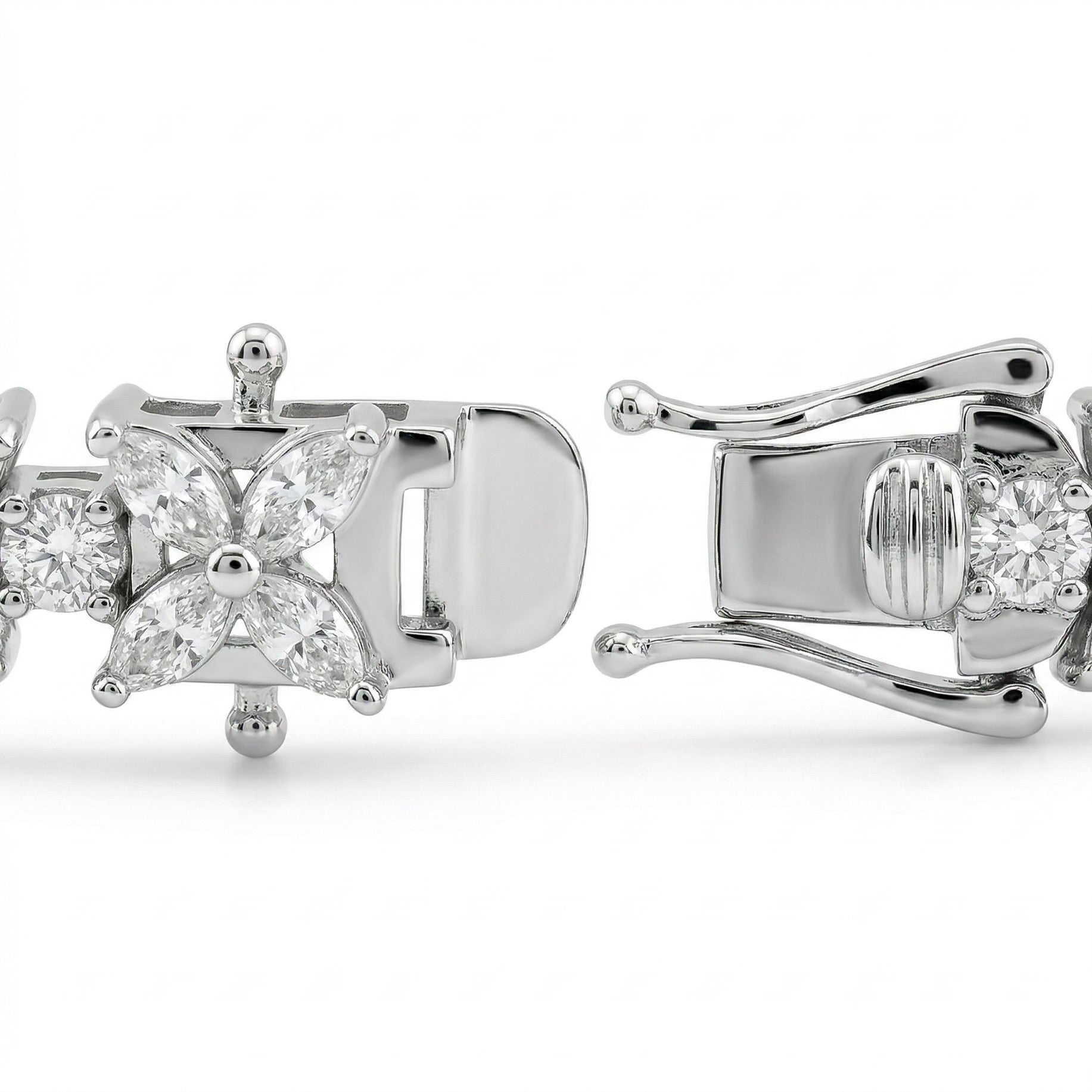 Close-up of Luminary moissanite bracelet clasp open, revealing secure mechanism in 925 sterling silver butterfly design.