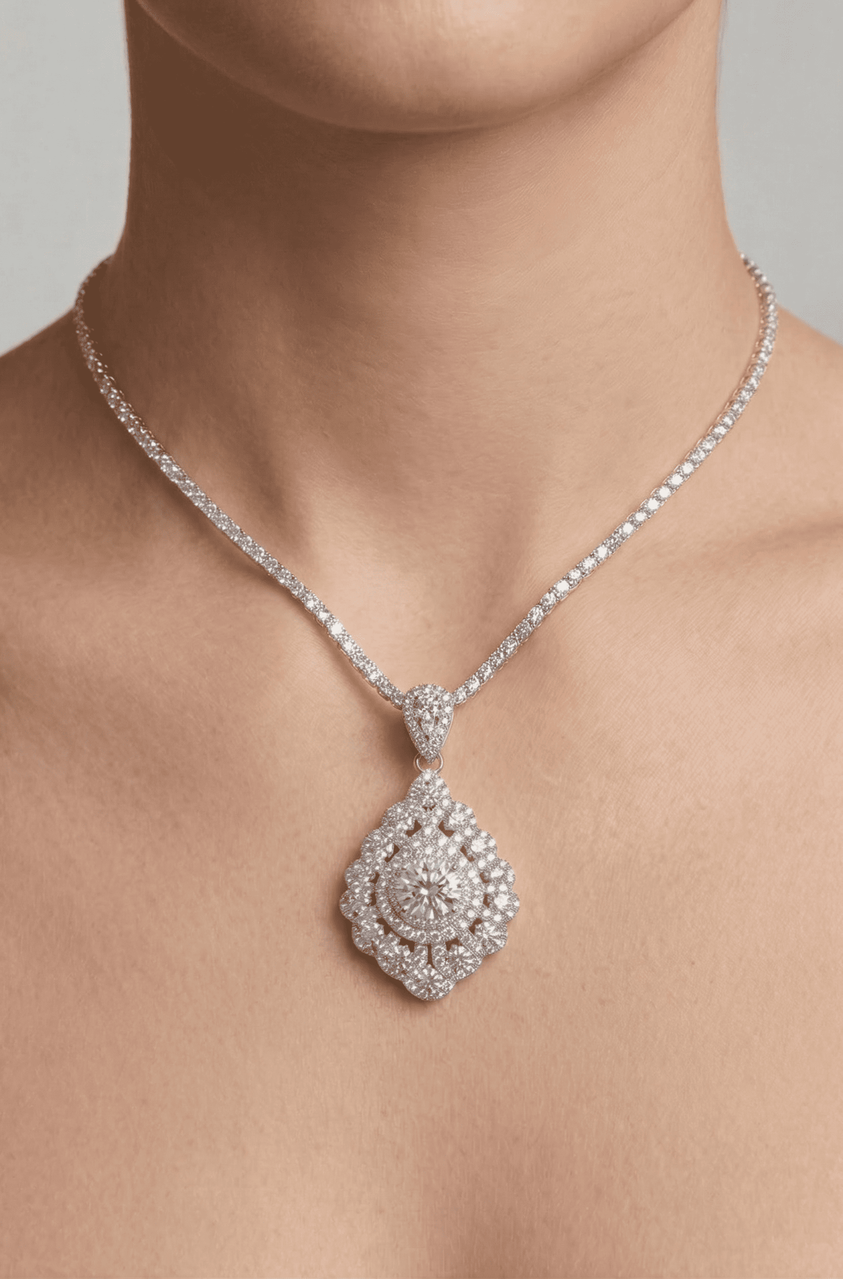 Celestia moissanite pendant worn as necklace, 1ct main stone 5.75ctw in 925 sterling silver lifestyle shot.