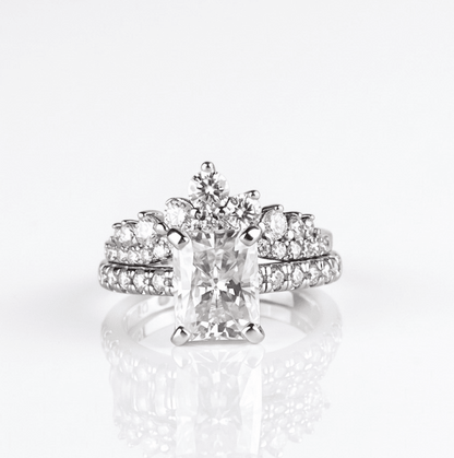 Evermore moissanite cluster ring paired with fully radiant moissanite ring, stacked styling in 925 sterling silver.