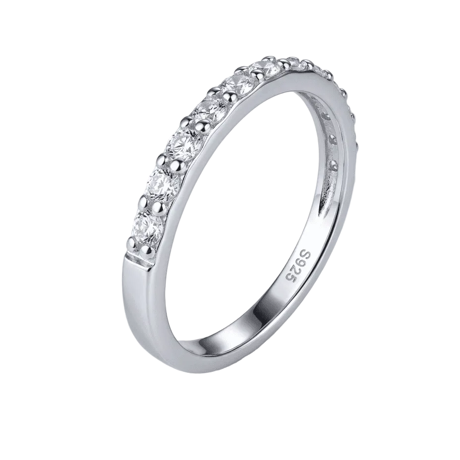 45-degree view of Half Eternity moissanite ring, hand set stone band in 2mm 925 sterling silver.