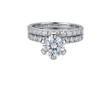 Half Eternity moissanite ring stacked and paired with other rings on finger, showing versatile styling in 925 sterling silver.