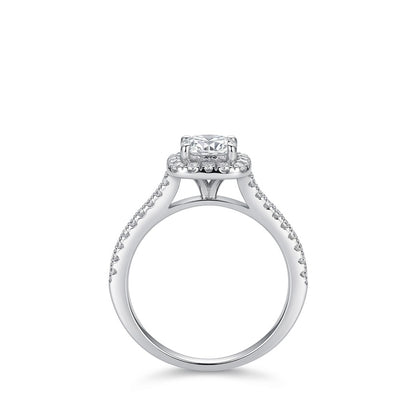 Silver ring with a moisanite on a white background
