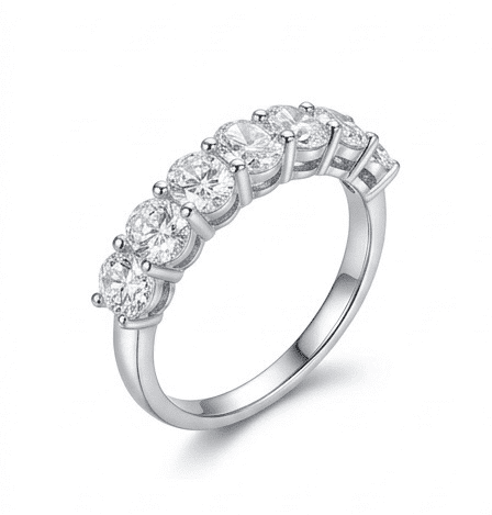 45-degree view of Sevenfold moissanite ring showcasing 7 brilliant oval moissanite stones in sterling silver.