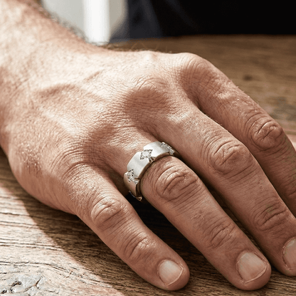 Nama moissanite ring worn on male
 finger, 3.6ctw fully hand set in 925 sterling silver lifestyle shot.