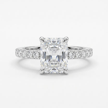 Radiant cut moissanite engagement ring in 925 sterling silver rhodium plated with pave band. Elegant diamond alternative jewelry.
