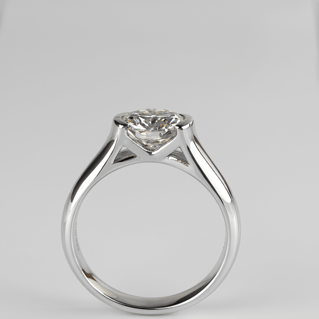 Whisperglow 2ct moissanite ring standing upright, sterling silver stackable band front view.