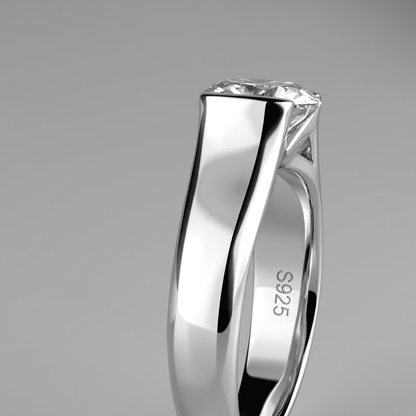 Side view of Whisperglow 2ct moissanite ring, slim sterling silver stackable band profile.