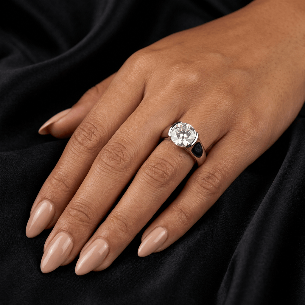 Whisperglow 2ct moissanite ring worn on finger, sterling silver stackable band elegant lifestyle shot.