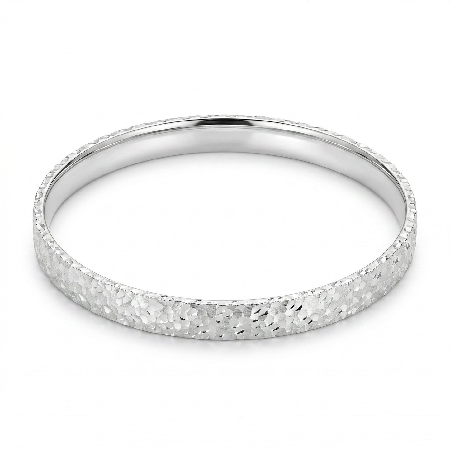 Top-down view of Mermaid Scale sterling silver bangle showcasing the full mermaid scale engraved pattern.