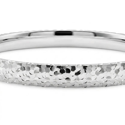 Close-up of Mermaid Scale bangle revealing intricate hand-crafted mermaid scale detail in 925 sterling silver.
