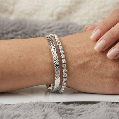 Mermaid Scale 925 sterling silver bangle worn on wrist, elegant lifestyle shot showcasing unique scale design.